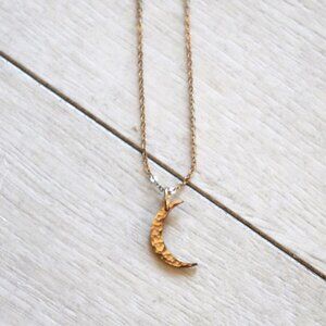 GLDN lunar phase gold necklace in waning crescent